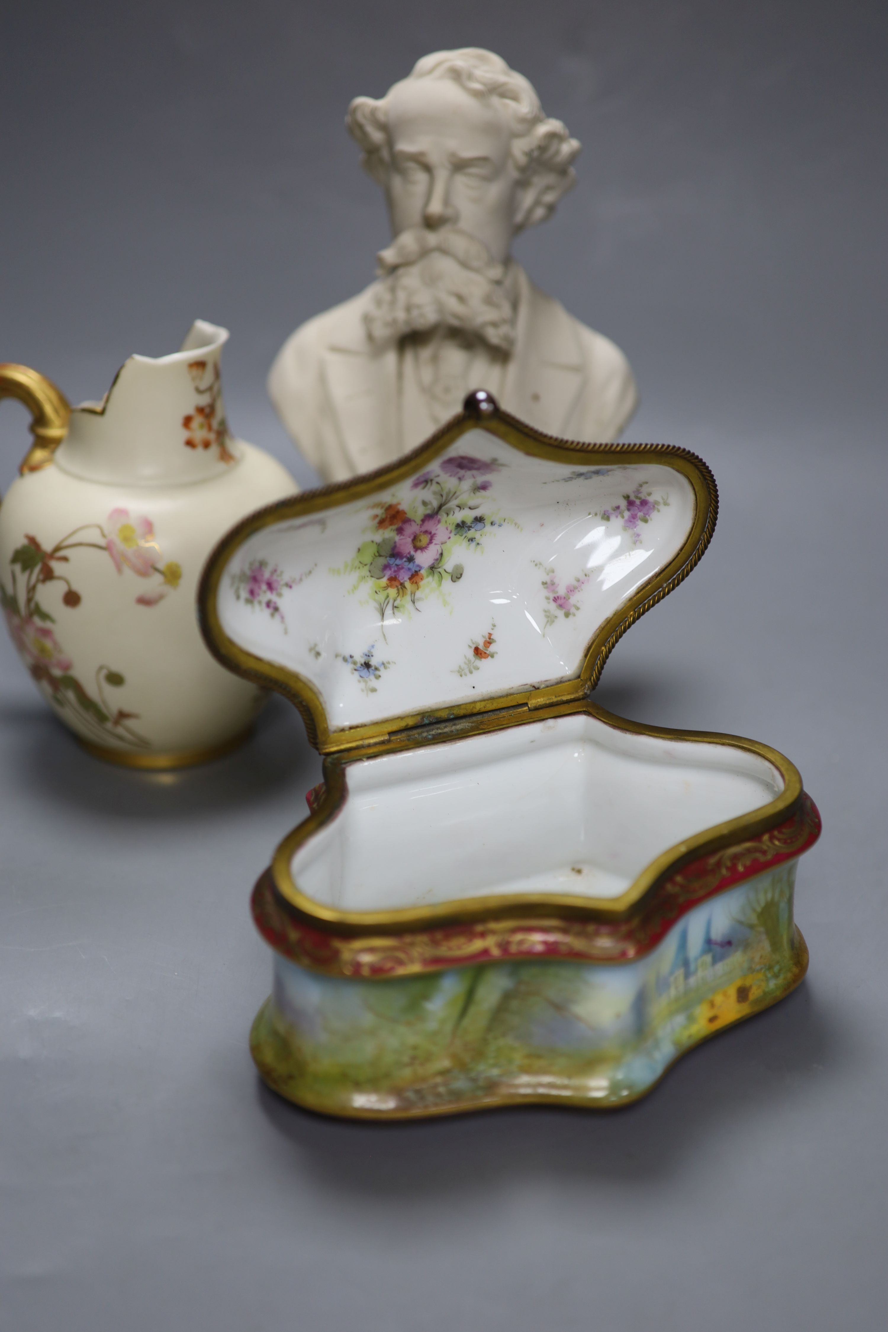 A Royal Worcester blush group cream jug, a Parian bust and a gilt metal mounted porcelain casket, tallest 24cm